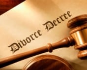 Dispute Resolution document with a gavel and paper on a wooden surface.