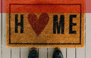 Couple looking at their dream home with mountain views in Western Colorado