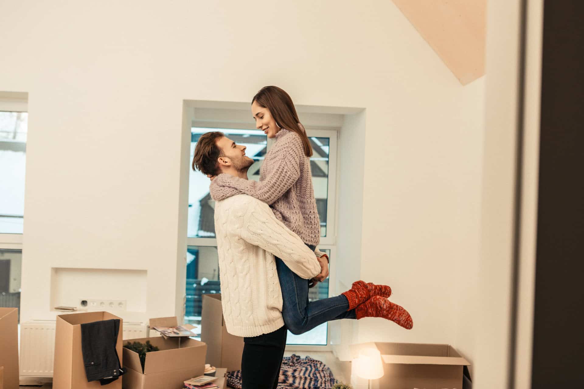 couple buying home winter